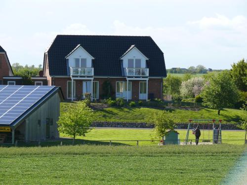 Фотографии гостевого дома 
            Ferienhaus Wattenmeerblick