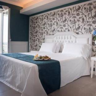 Фотографии гостиницы 
            Bianco Riccio Suite Hotel