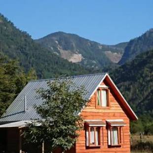 Фотографии гостевого дома 
            Coñaripe Kuyen Mapu Cabañas