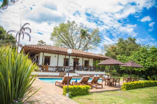 Фотографии гостиницы 
            Hotel Casa de Campo El Delirio