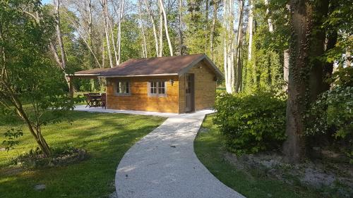 Фотографии гостевого дома 
            Chalet au Coeur de Foret Gouvieux