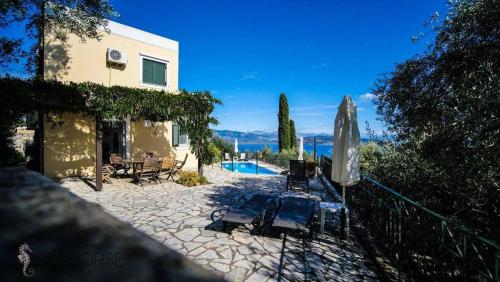 Фотография гостевого дома Seahorse Villa Amazing pool house over Agni and Kalami Sleep 6