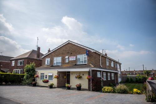 Фотография гостевого дома Holcombe Guest House