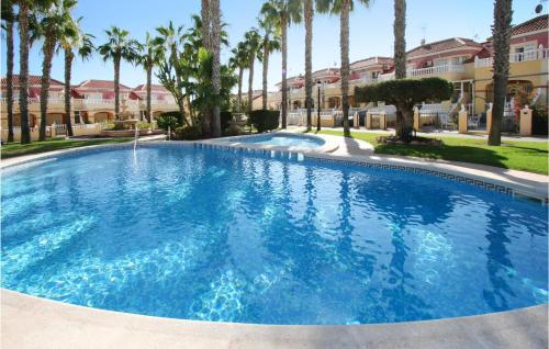 Фотографии гостевого дома 
            Two-Bedroom Holiday home Orihuela Costa with an Outdoor Swimming Pool 07