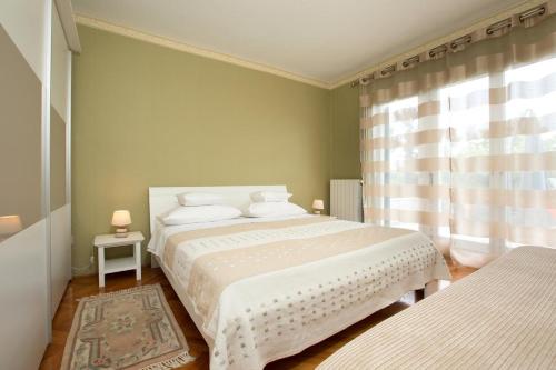 Фотография гостевого дома Apartments by the sea Lovran, Opatija - 7837